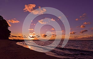 Silhouette sunset of beach under cloudy sky in Phoe Kalar Island, Chaung Thar, Myanmar.