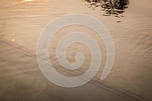Silhouette of swimming pool.