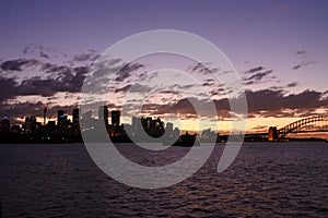 Silhouette of Sydney Skyline at dramatic sunset