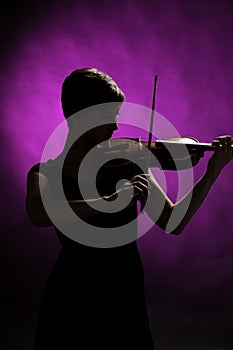 Silhouette of Teenage Girl Violinist
