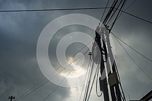 Telecommunication Pole Under a Cloudy Sky