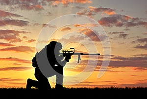 Silhouette of a terrorist with a rifle