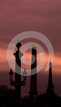 Silhouette of three architectures in the sunset