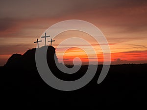 Silhouette of three crosses on hill at sunset. Religion Crucifixion Of Jesus Christ