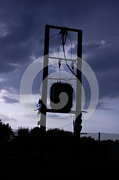 Silhouette of Three phase 11KV overhead powerline with transformer on pole