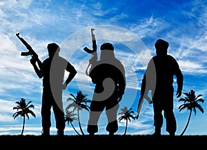 Silhouette of three terrorists