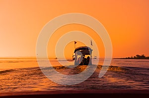 Silhouette of tourist in the boat at Red lotus sea,Udonthani province Thailand - Image