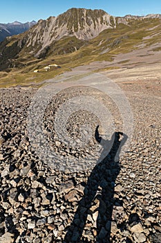 Silhouette of tourist waving in Southern Alps