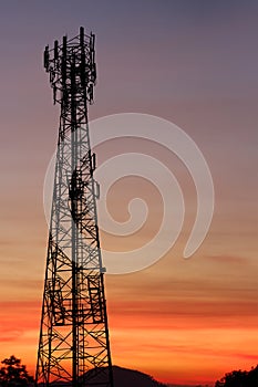 Silhouette tower telecoms at sunset