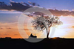 Silhouette of a tractor