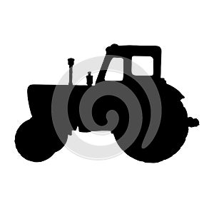 Silhouette of a tractor