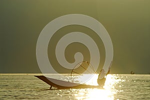 Silhouette of traditional fishermans in Inle Lake,Myanmar.