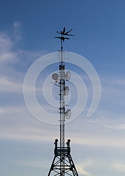 silhouette on transmitting tower