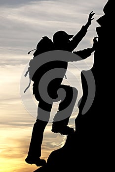 Silhouette of a traveler tourist mountaineer