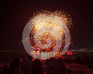 The silhouette of traveller watching fireworks and celebrating