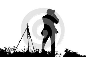 Silhouette of trekking men take photo on the mountain