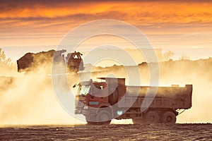 Silhouette of the truck in the building site