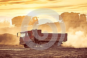 Silhouette of the truck in the building site