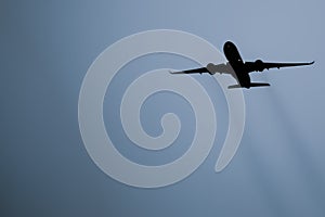 The Silhouette of a twin-engine airplane