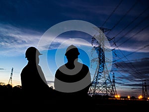 Silhouette of two engineers