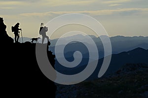 Mountain hikers silhouette photo