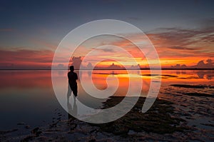 Silhouette of unidentified local people at jubakar beach,  tumpat kelantan. Malaysia  man at