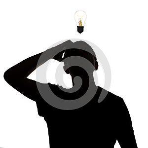 Silhouette of an unknown man thinking how to solve the problem, confusedly the scaly head on a white isolated background, concept