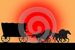 Silhouette of van with horses and cowboy