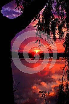 Romantic and tropical sunset over the sea with spectacular colors