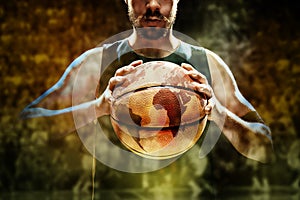 Silhouette view of a basketball player holding basket ball on black background