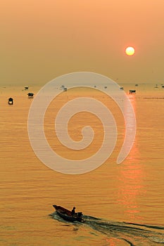 Silhouette view at sunrise time of bamboo cottage at Bang Tabun, Phetchaburi, Thailand