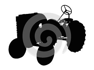 Silhouette of a Vintage Small Tractor