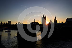 Silhouette of Westminster bridge with london doubledecker bus.