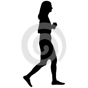 Silhouette on a white background of a woman on a walk
