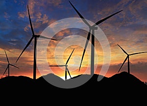 Silhouette of a wind turbine generating electricity