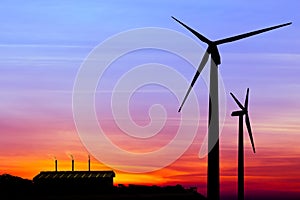 silhouette wind turbine generator with factory emissions of carbon dioxide