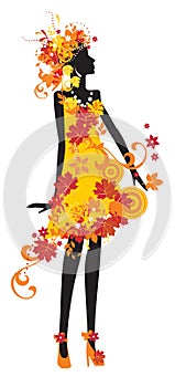 Silhouette of woman with autumn leaves