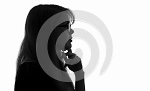 Silhouette of a woman in business attire on isolated background