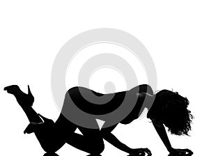 Silhouette woman crouching photo