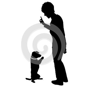 Silhouette of woman and Dog sitting on its hind legs on a white background