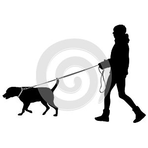 Silhouette of woman and dog on a white background