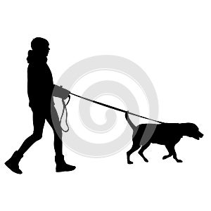 Silhouette of woman and dog on a white background