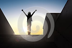 Silhouette of woman or girl showing thumbs up
