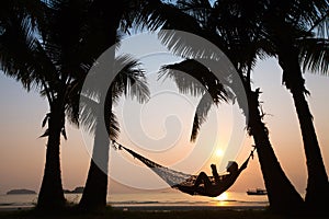 Sunset in hammock on the beach