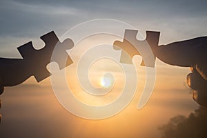 Silhouette Woman hands connecting couple puzzle piece against sunrise, Business solutions, target, success, goals and strategy co