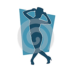 Silhouette of a woman in happy dance action.