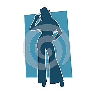 Silhouette of a woman in happy dance action.