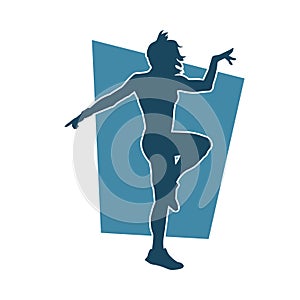 Silhouette of a woman in happy dance action.