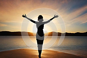 Silhouette of a woman happy and free open arms on beach.