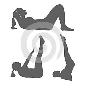 Silhouette of a woman performing fitness exercises lying on the abdominal muscles. Girl is engaged in a gym or at home, outdoor